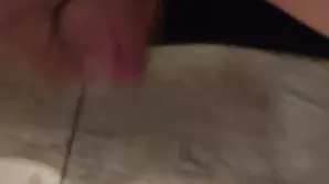 A sexual woman caresses herself lost in a sea of pleasure