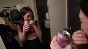 A young pretty girl in mesh and leather corset caressing herself