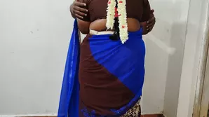 A sexy girl in mesh and leather corset caressing herself with a red ball