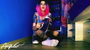 Cute girl just wants to have fun swinging on the monkey bars