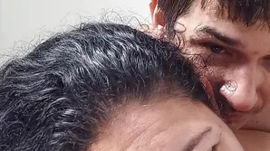 Blonde woman performing oral sex with passion