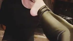 A cute small blonde gets out of her clothes and caresses herself