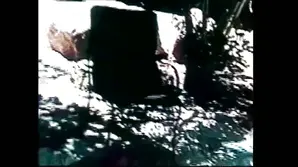 Hot brunette with long hair posing in sexy stockings on a white background