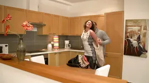 A sexy brunette is doing other girls' make up for theControllers