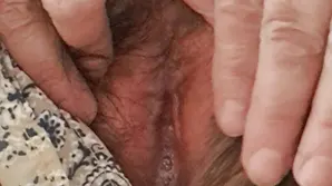 Two cute girls are having a competition to see who is more daring