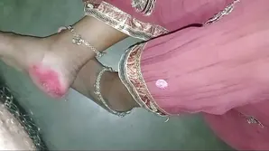 A sexy chick in a transparent dress tries to catch someone's cock