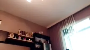 Pretty brunette woman masturbating her sweet pussy with a toy