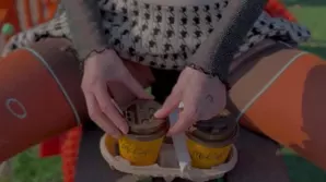 Cute girl is having fun on a camera for the first time